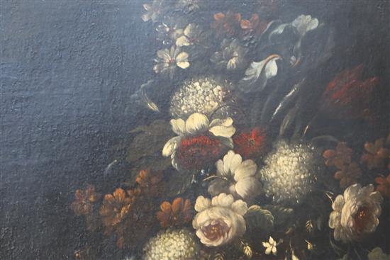 17th century Flemish School Still life of flowers and fruit on a table top 42 x 63in.